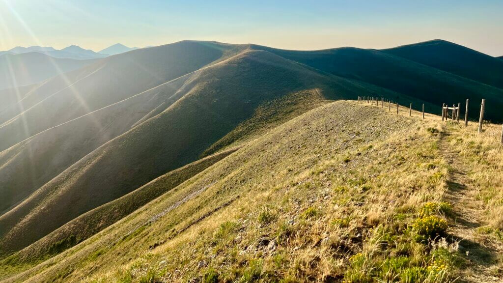 Large open ridge with a route atop it.