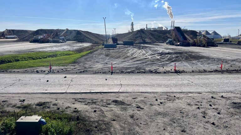 View of two large sugar beet piles.