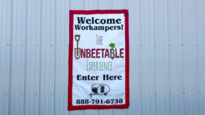 Sign with details on how to sign up for the sugar beet harvest.