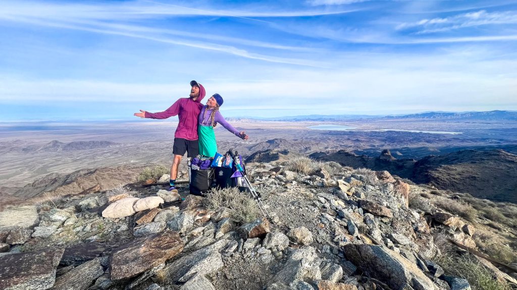 A couple on top of a mountain in California.