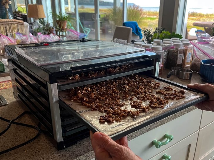 Putting the beyond beef into the dehydrator.