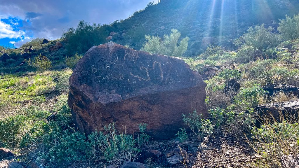 Don't be these a$$holes who defaced petroglyphs.