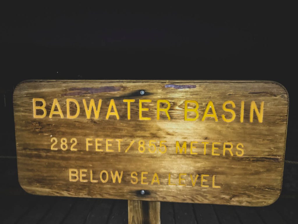 The elevation sign in Death Valley National Park for Badwater Basin, the start of the Lowest to Highest Route.