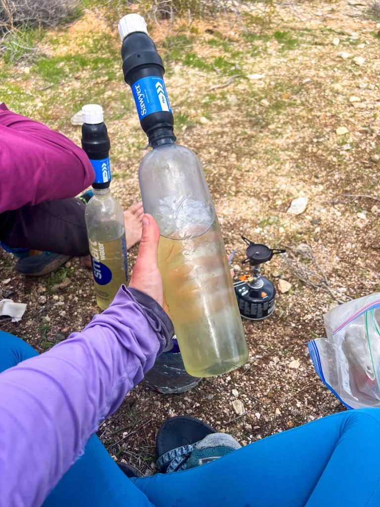 Desert water in a bottle with a Sawyer Filter.