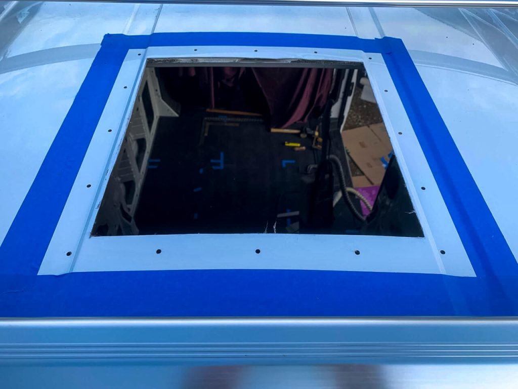 A van roof with all holes pre-drilled in preparation for a MaxxAir Fan Deluxe installation.