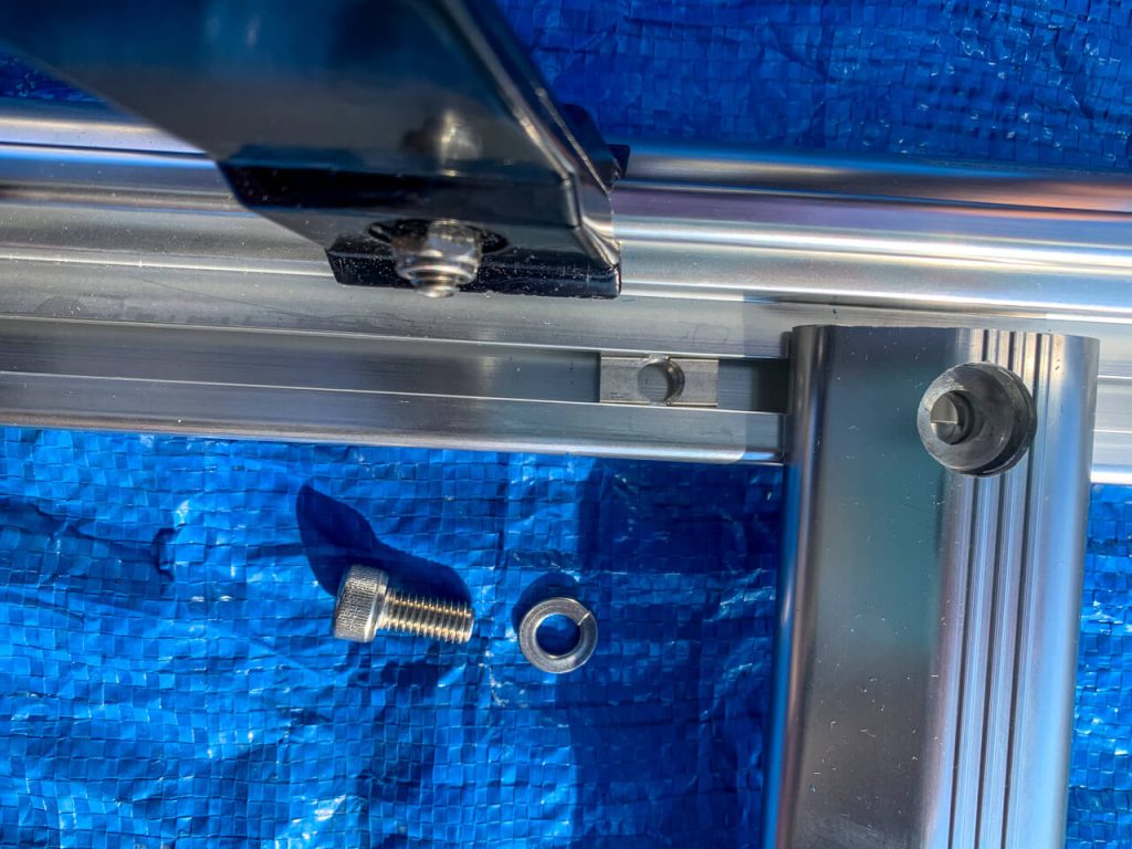 Adding the Prime Design Alurack cross bars to the side bars on the ground.