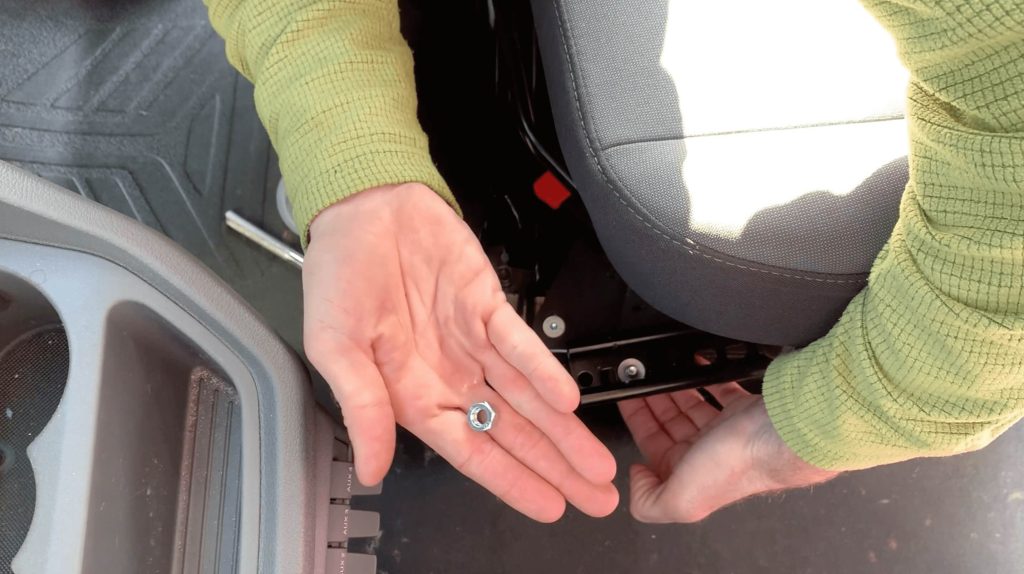 Using the provided bolts to attaching the passenger seat to the Scopema Swivel Seat.