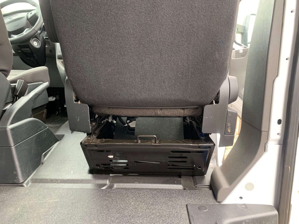 This is what the back of a Ford Transit passenger seat looks like before adding the Scopema Swivel Seat.