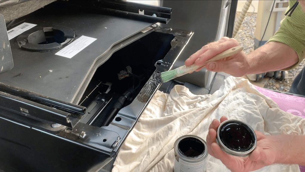 Adding Rustoleum to prevent rust on raw, shaved metal.