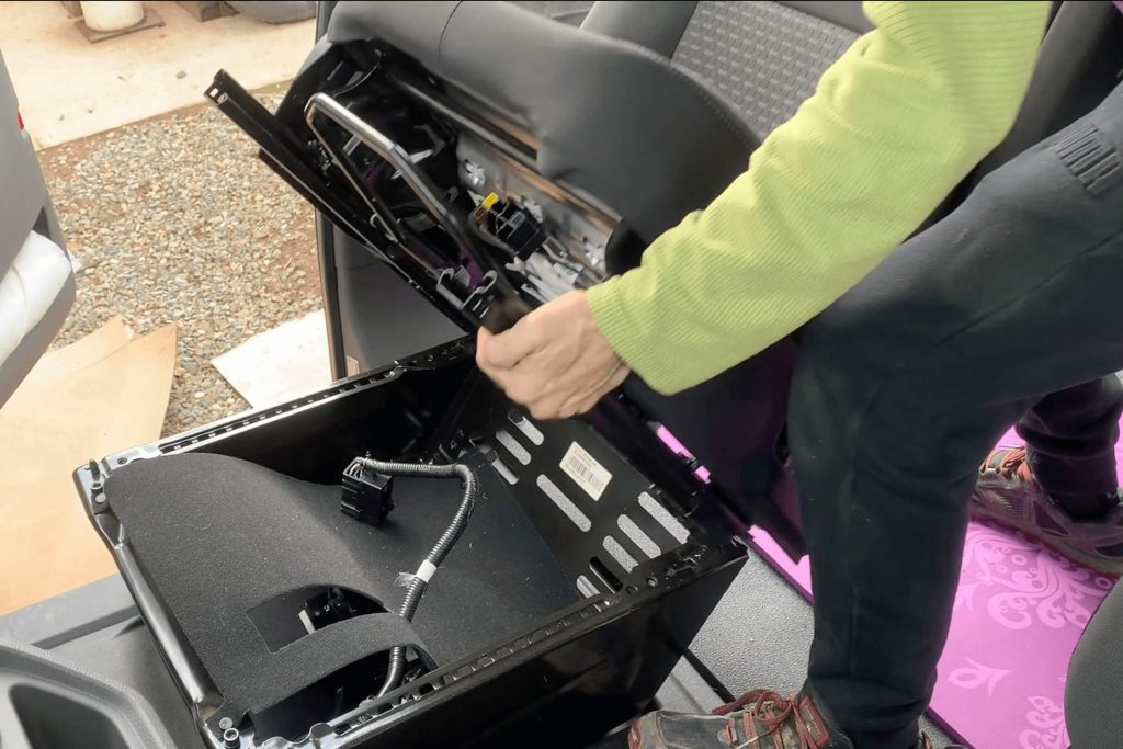 The Scopema Swivel Seat goes between the passenger chair and the seat base and you'll remove the chair backwards.