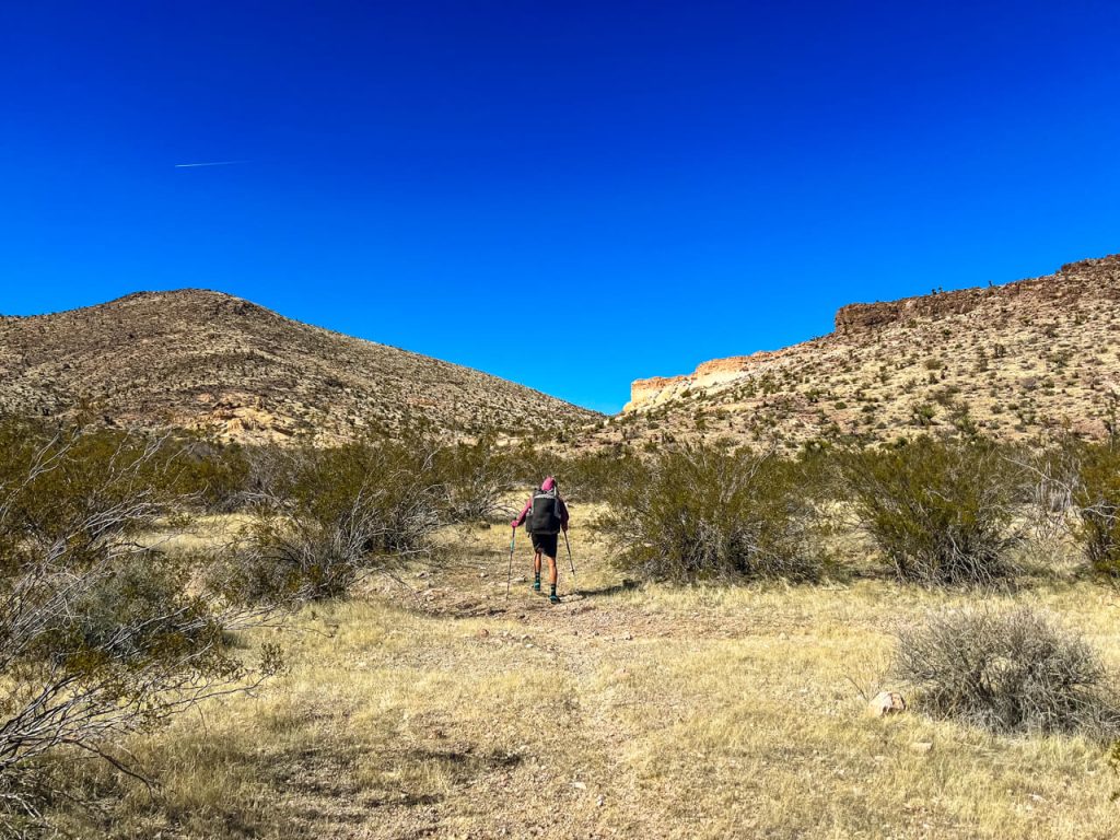 A hiker uses a burro trail to hike more efficiently.