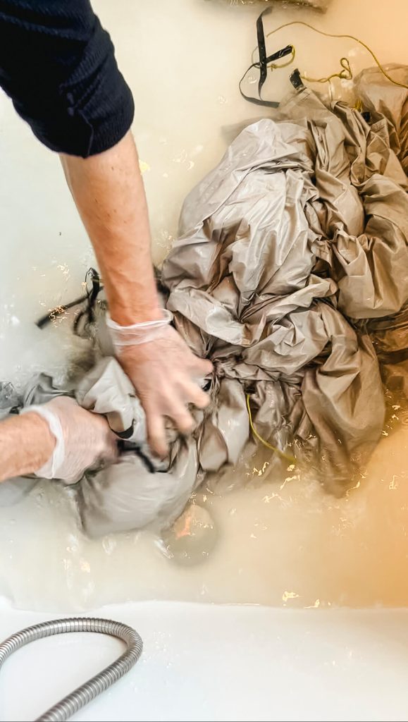 Make sure to squeeze in the tech wash as you agitate.