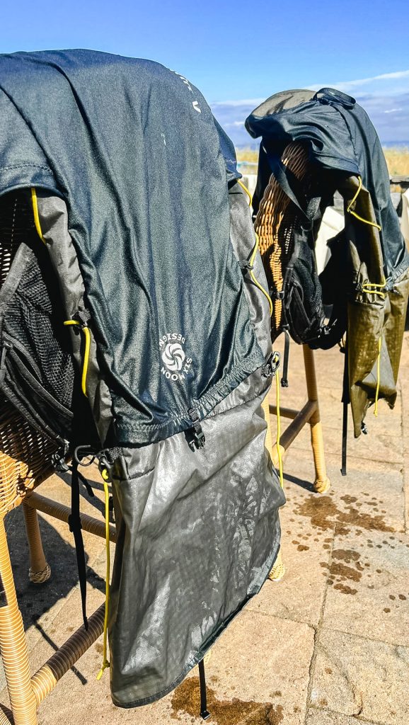 Drying washed hiking backpacks in the sun.