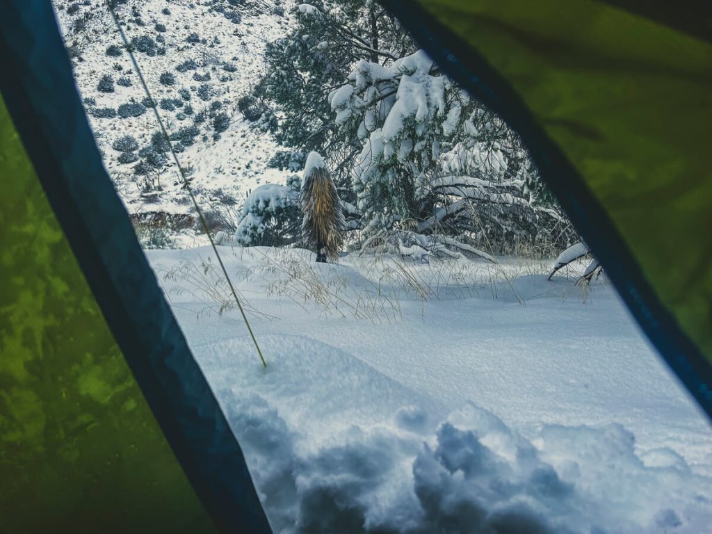 View outside the tent of the previous night's snowfall.