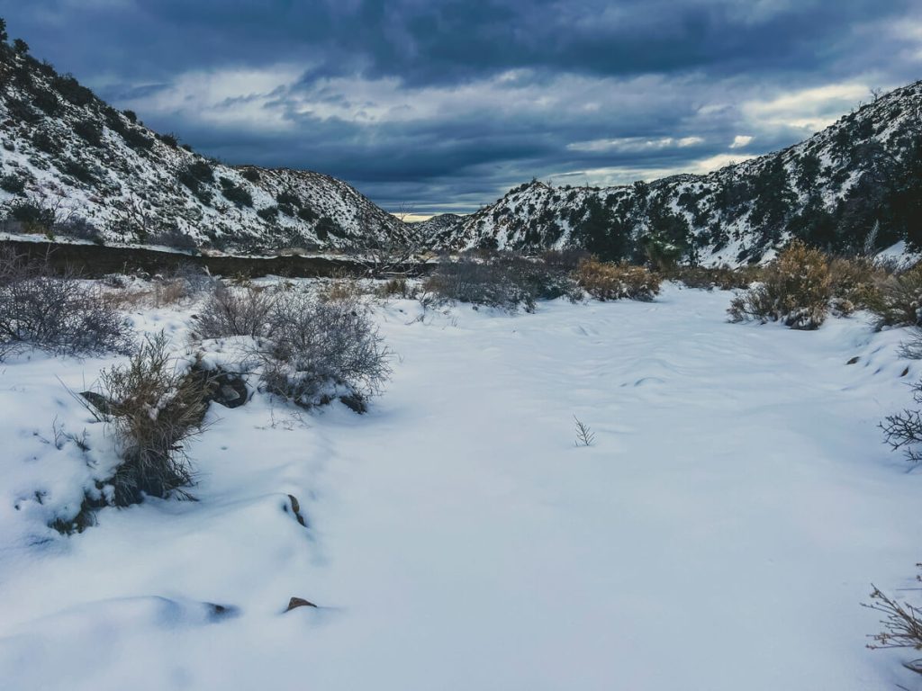 Looking down valley as the snow gets less.