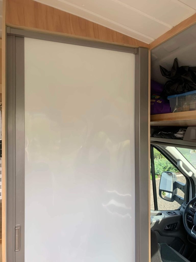 Completed indoor shower with nautilus self cleaning door.