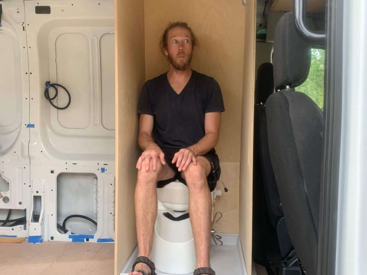 Testing out the toilet placement in our van shower stall.