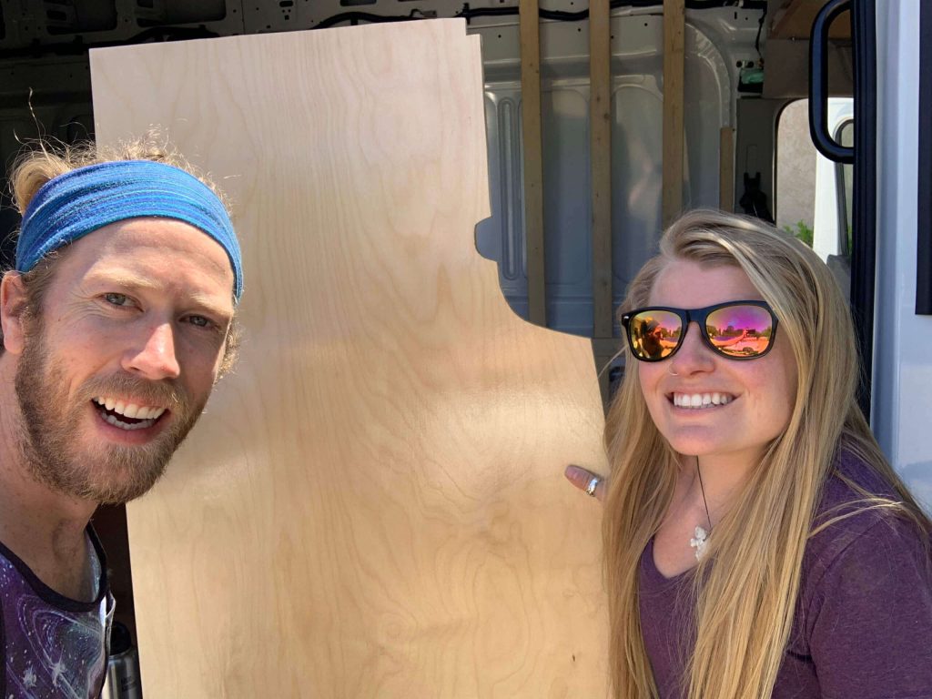 Karma and Veggie with their first wall for the van build.