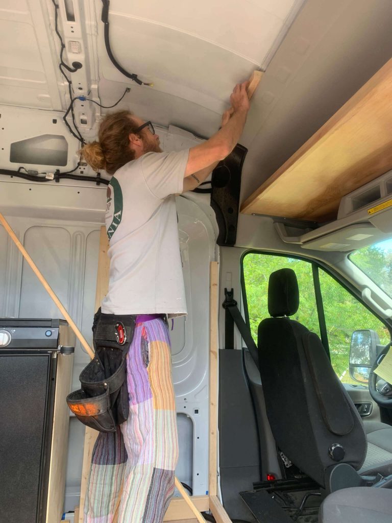 Bolting in the wall framing.