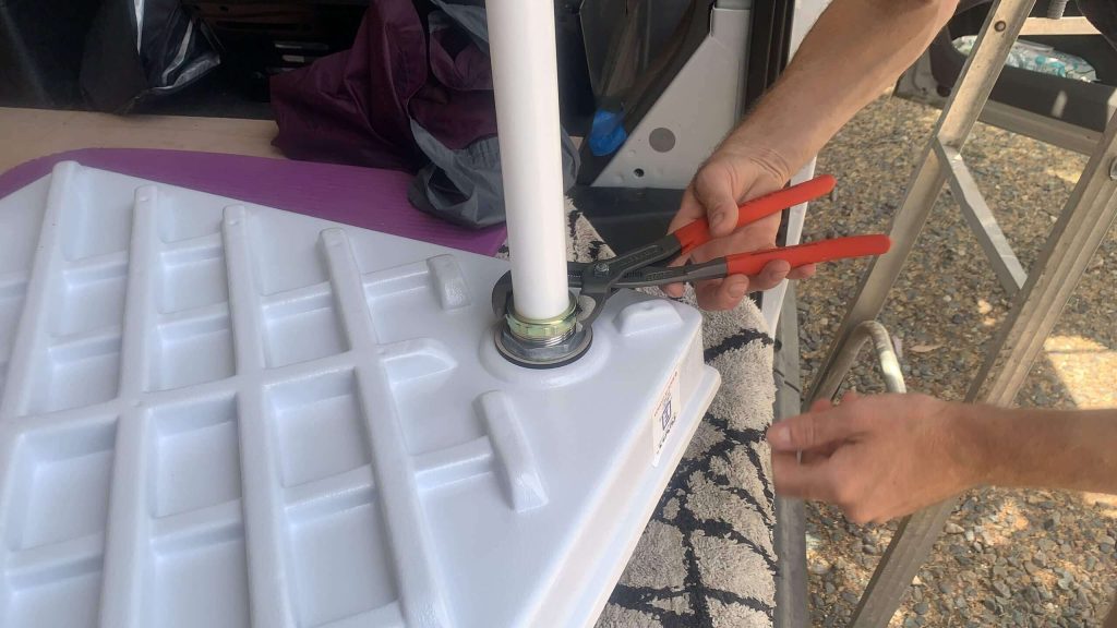 Adding the van shower tailpipe for the plumbing.
