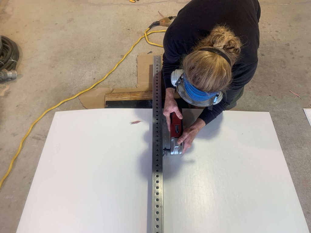 Carefully cutting FRP Board with an Oscillating Multi-Tool.