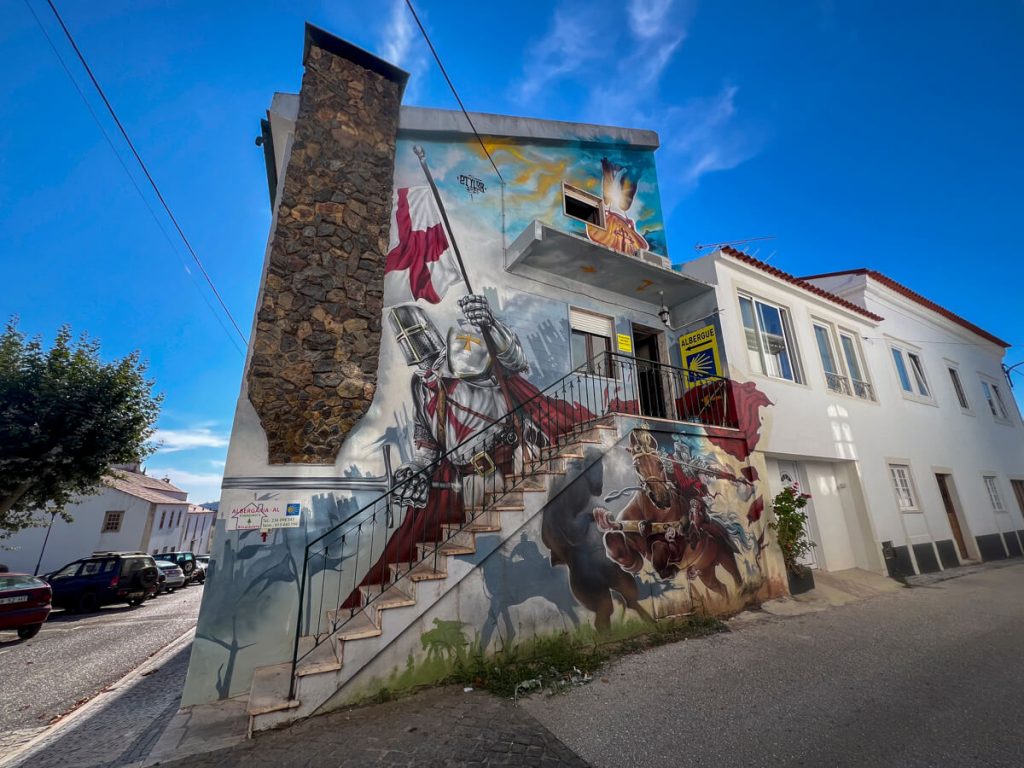 An albergue with a large Knight's Templar mural.