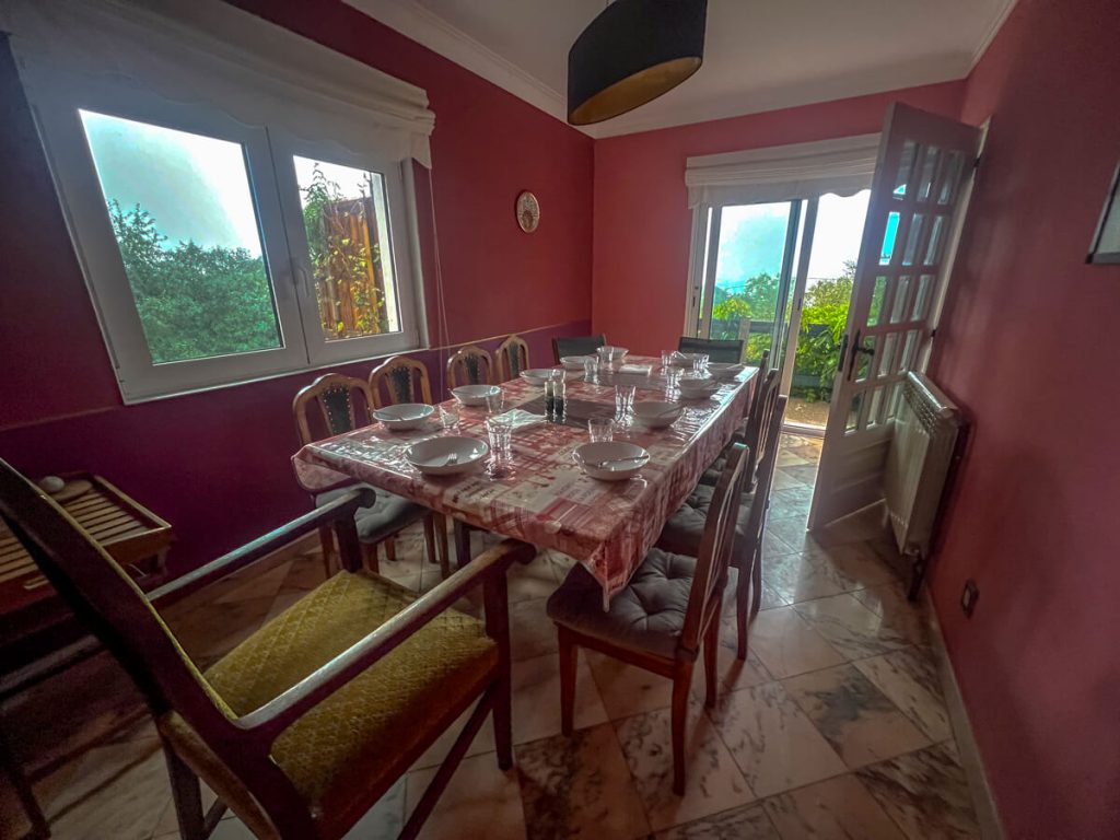 Communal dinner at Casa Gwendoline albergue.