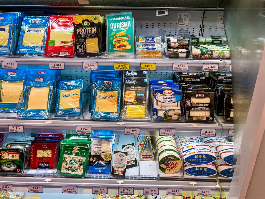 Vegan Cheese exists by the regular cheese in grocery stores on the Camino.