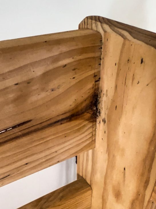 Wood bed frame that has bed bugs living in it.