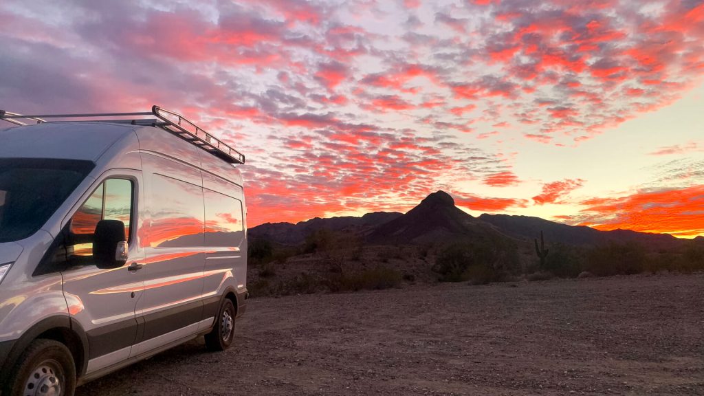 Boondocking in Arizona in Winter with a bright sunset.