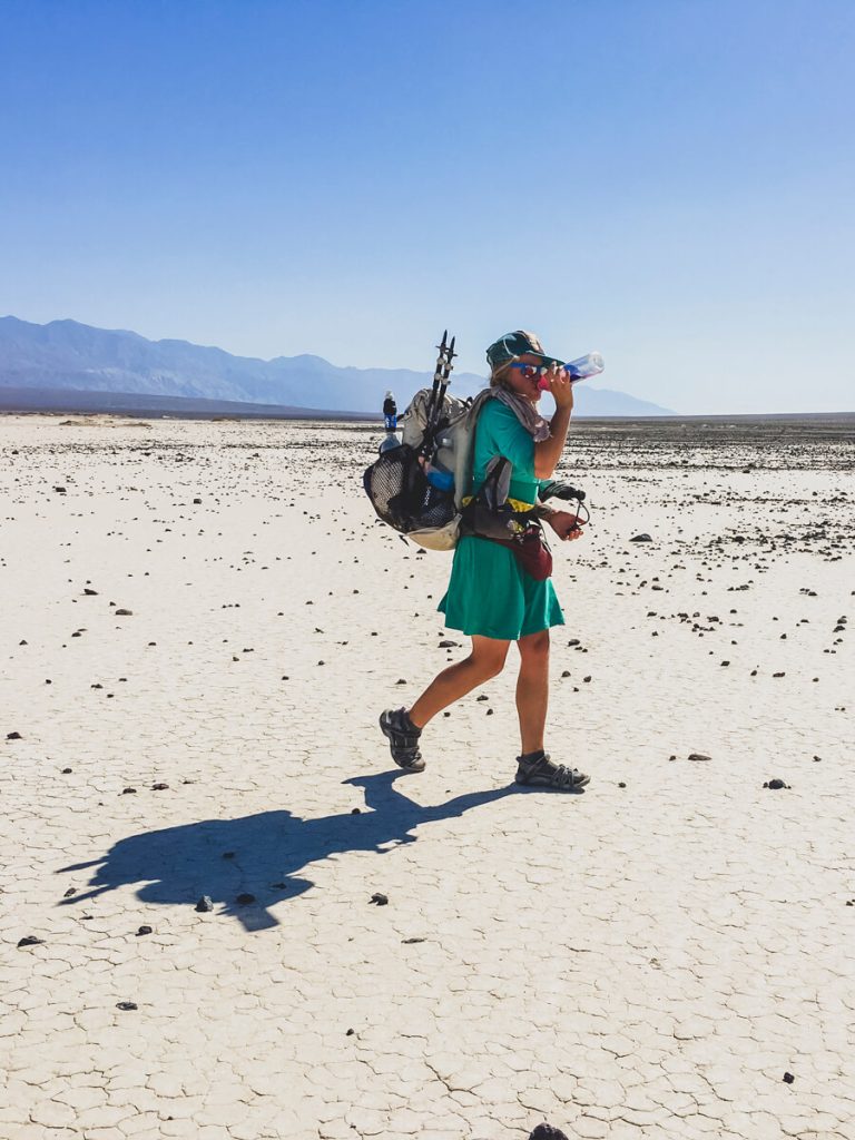 Woman thru-hiker on the Lowest to Highest Route wearing a Hyperlite Mountain Gear Windrider backpack.