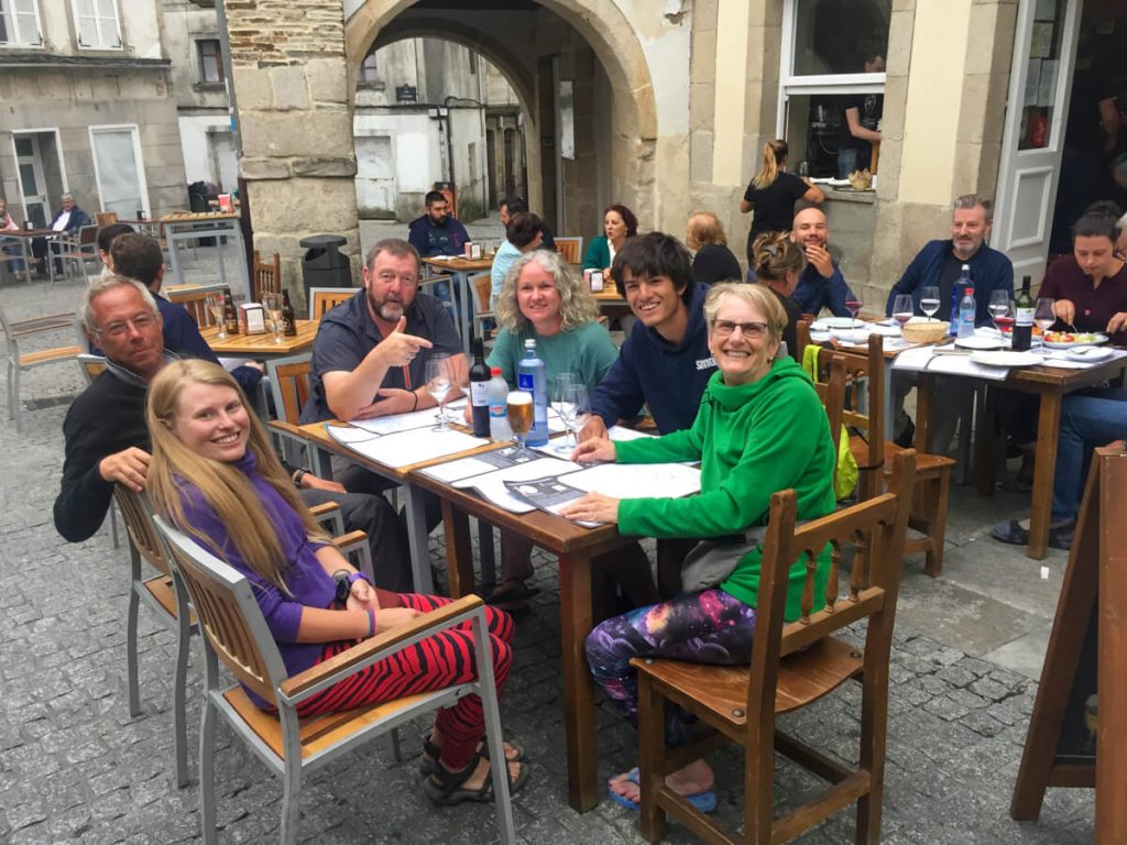 Camino family eating at a restaurant with outdoor seating.