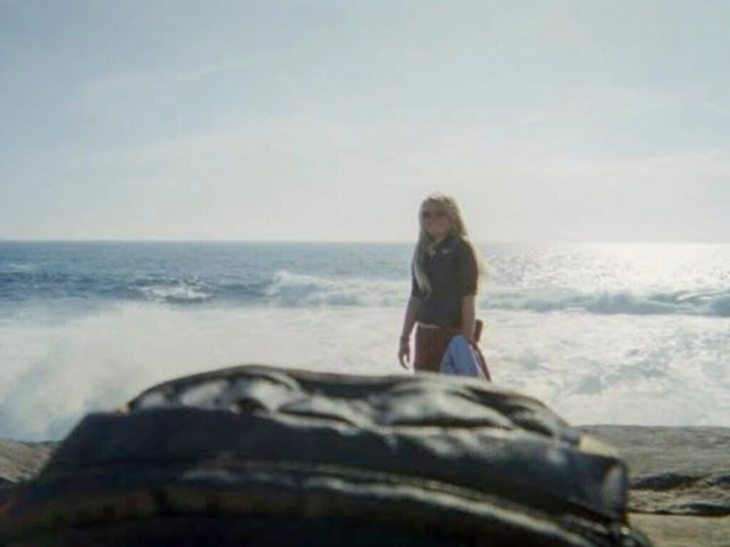 Camino hiker in Muxia, Spain at the Atlantic Ocean.